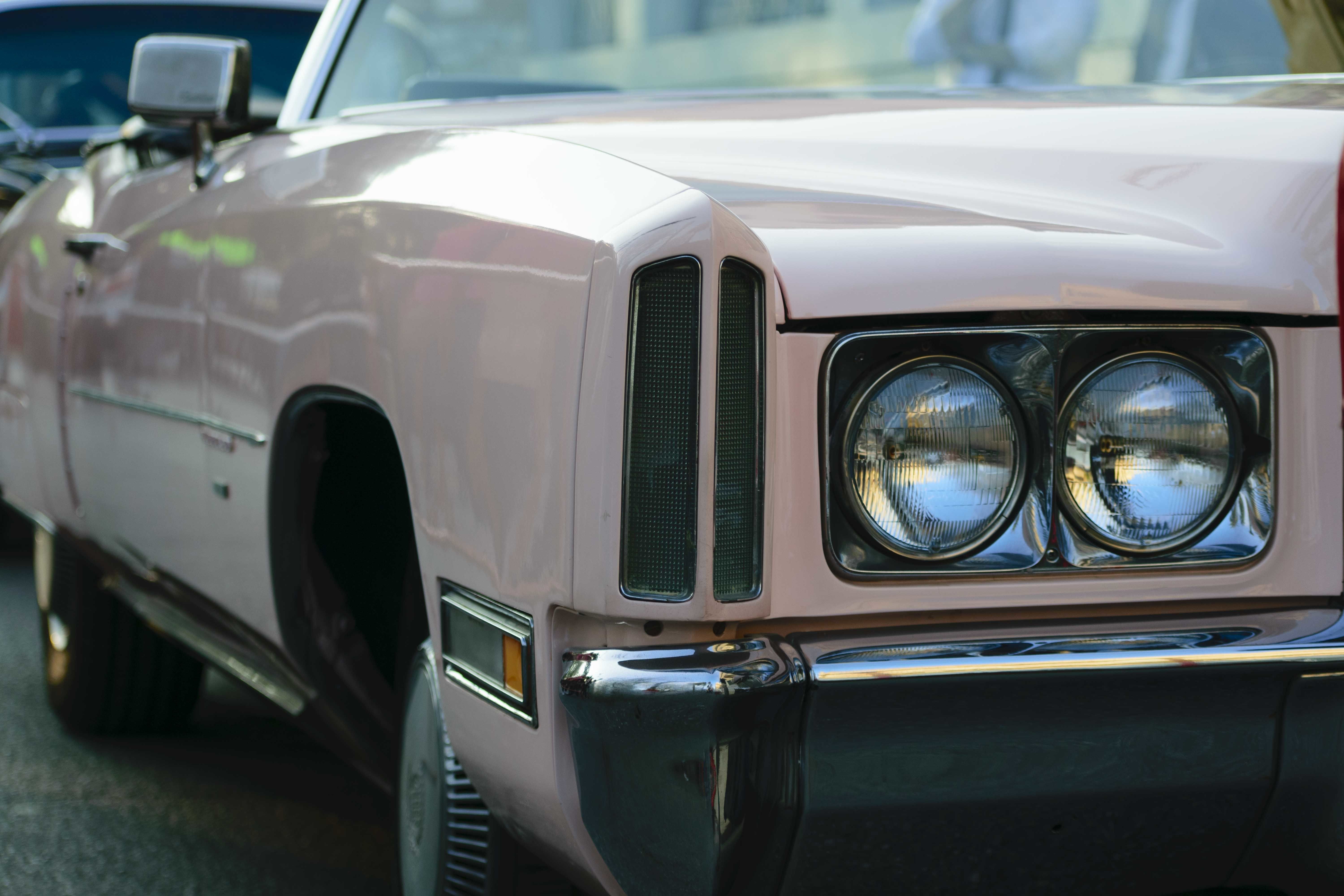 closeup-shot-headlights-beige-antique-car